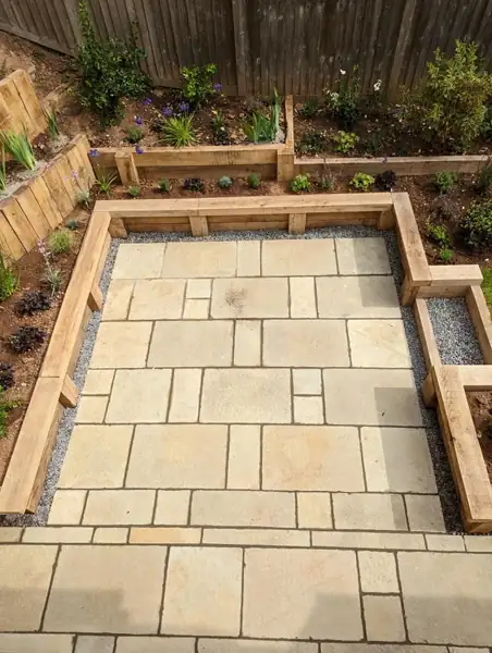 Terraced garden with sleeper beds, new lawn and patio